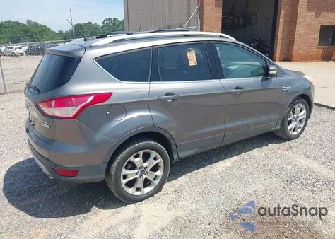2014 Ford Escape Titanium z USA, uszkodzony, nr VIN 1FMCU0JX3EUA26519